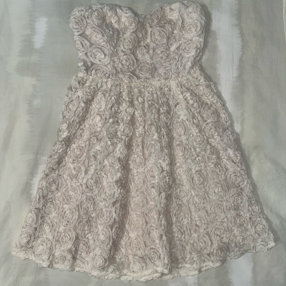 Chelsea & Violet Strapless Ivory Rosette Dress